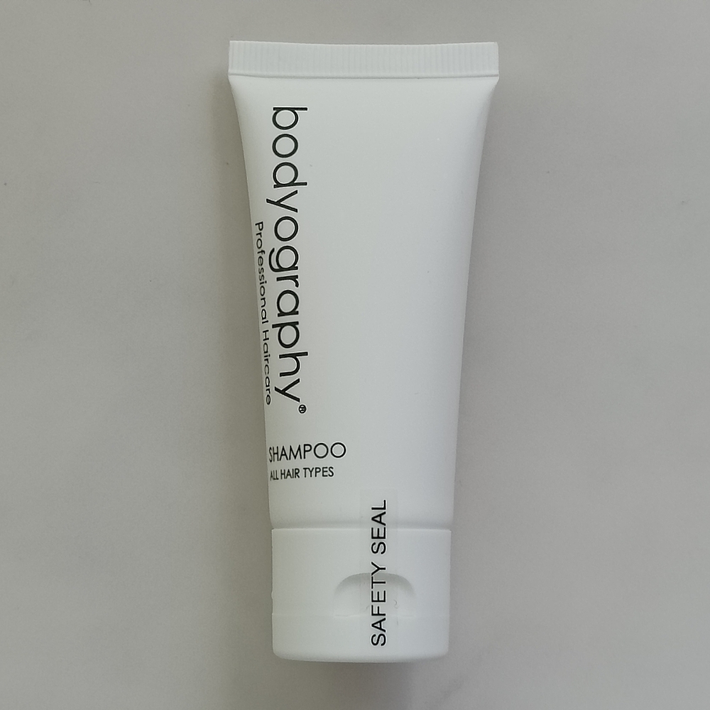 FREE WITH ANY PURCHASE NEW BODYOGRAPHY PROFESSIONAL HAIRCARE TRAVEL SIZE SHAMPOO